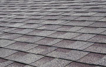 Channels End tiles for shallow pitch roofing